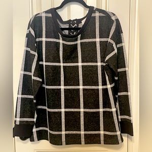 Super cute and fun Top with blocked design and lace-up back for a bit of sass!